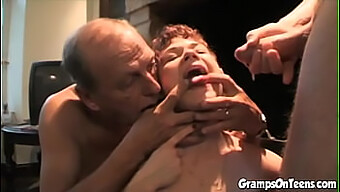 A Young Woman Gives Oral Sex And Engages In Sexual Intercourse With An Elderly Man In A Threesome Scenario.