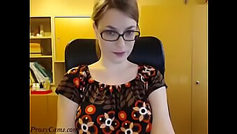 Glasses-Wearing Nerdy Girl Gets Naked And Dances Seductively On Webcam