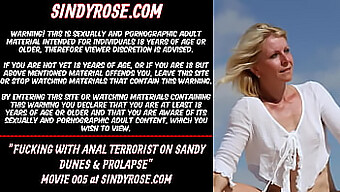 Sindy Rose Takes On Anal Penetration With A Dildo On A Sandy Desert